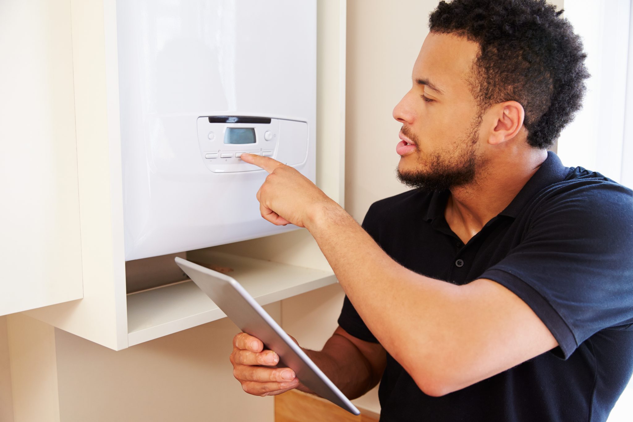 Gas Engineer servicing tenants boiler in Bristol