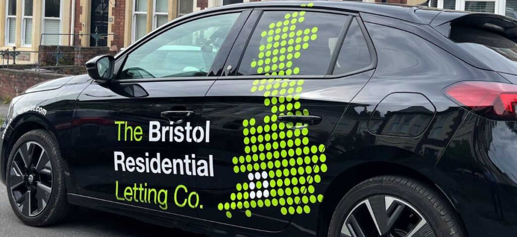 Bristol Residential Lettings company car parked outside a row of Bristol houses